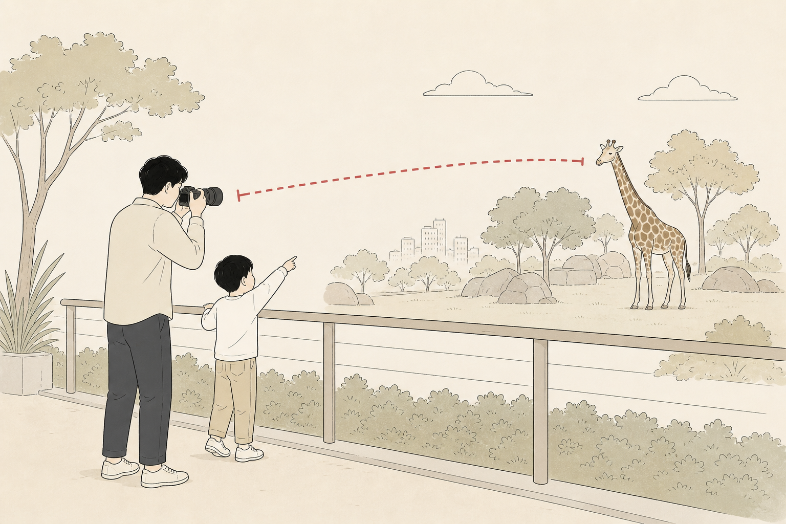 動物園で遠くの動物をズーム撮影する親子