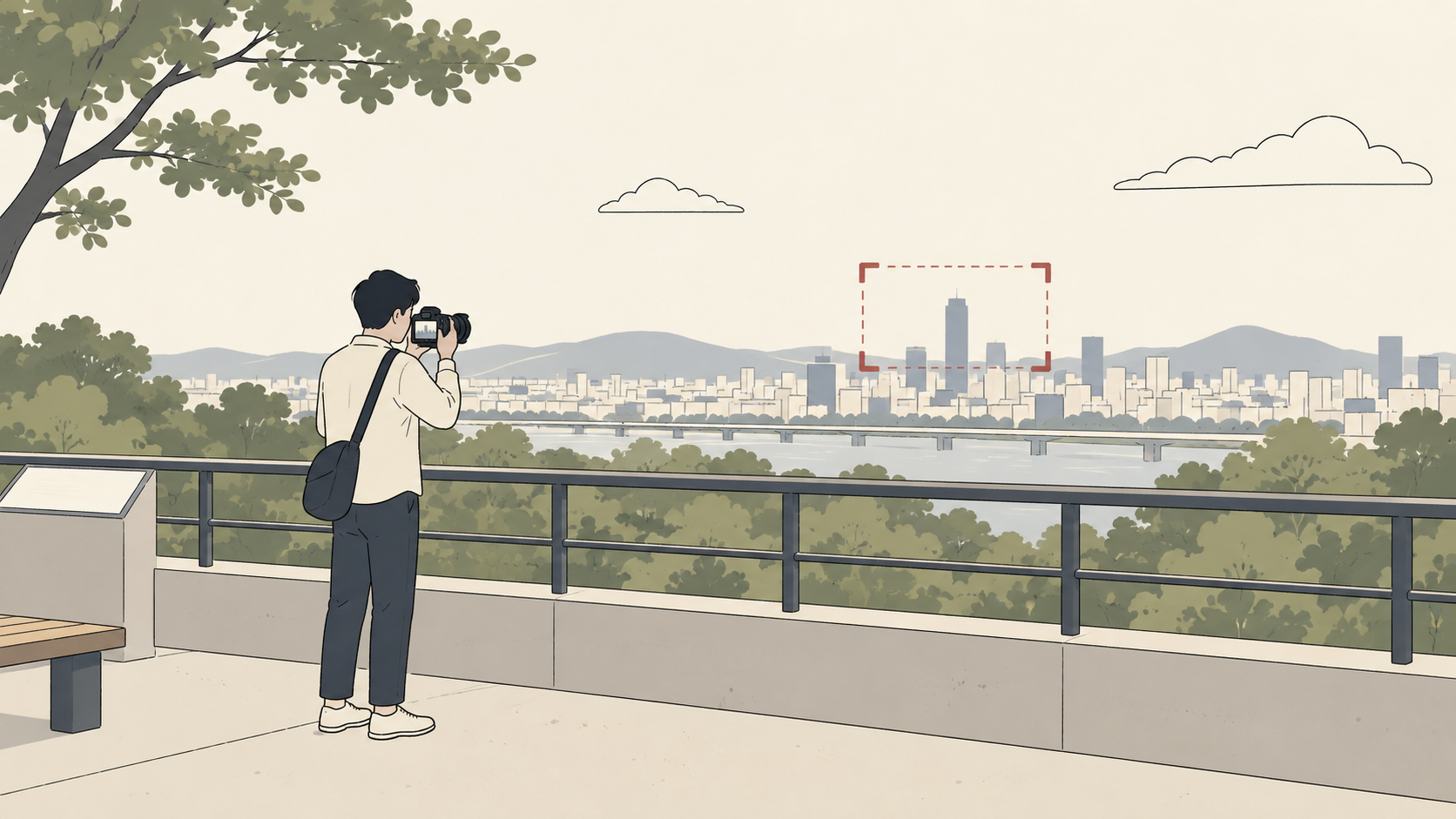 展望場所から構図を決めて都市の映像を撮影する人