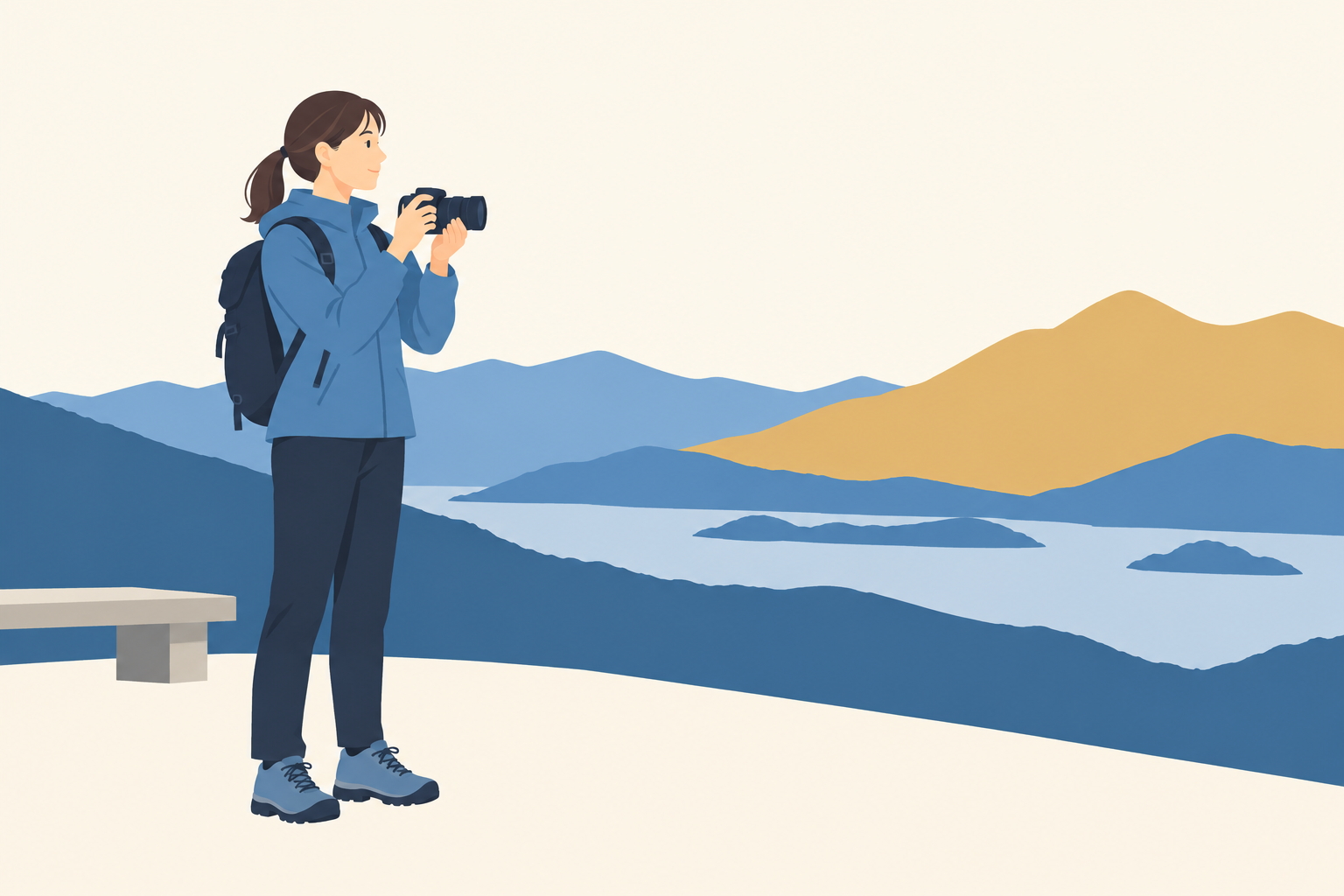 日帰りの山歩きでカメラを構える人のイメージ
