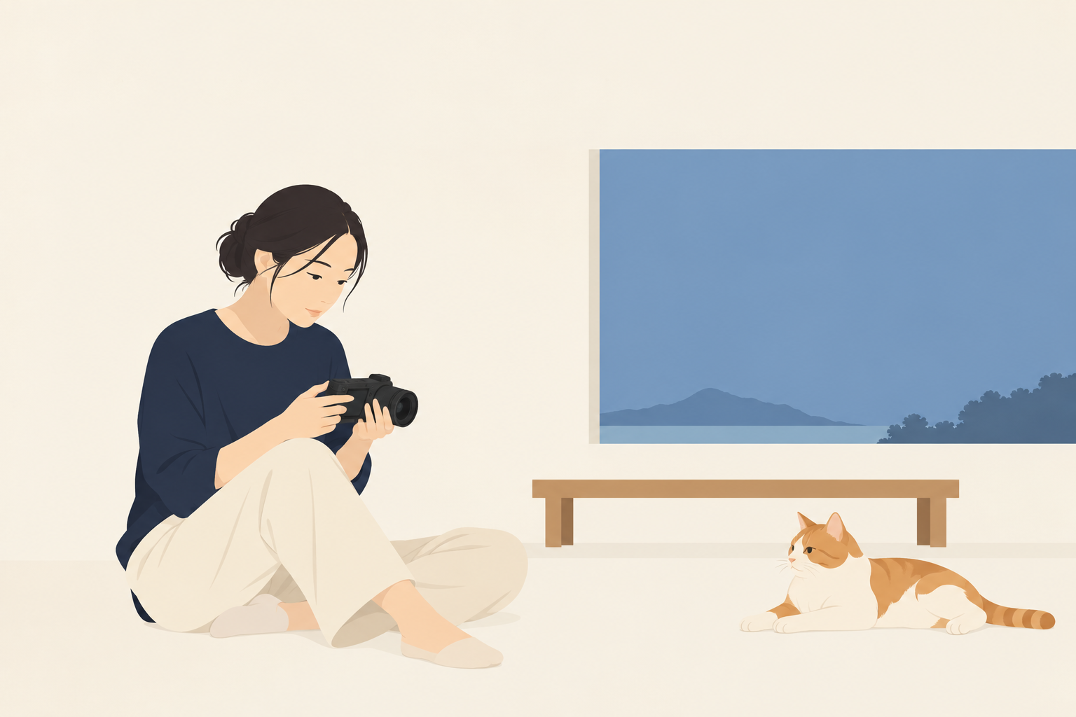 くつろぐ茶白の猫のそばで、カメラの背面画面を見直す女性の挿絵