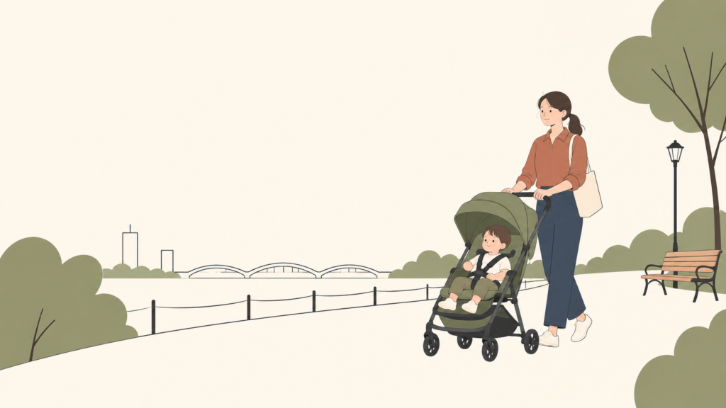 ベビーカーを押して屋外を歩く親子のイラスト
